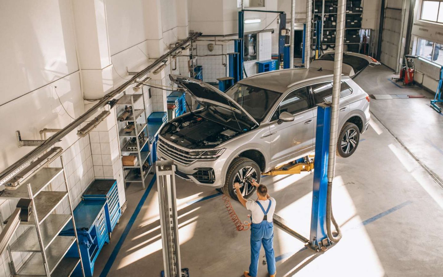 auto-mechanic-checking-car